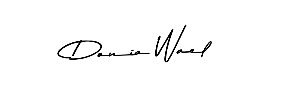 Make a beautiful signature design for name Donia Wael. With this signature (Asem Kandis PERSONAL USE) style, you can create a handwritten signature for free. Donia Wael signature style 9 images and pictures png