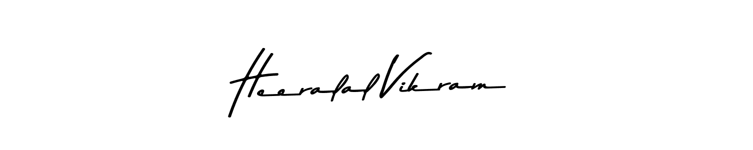 How to make Heeralal Vikram name signature. Use Asem Kandis PERSONAL USE style for creating short signs online. This is the latest handwritten sign. Heeralal Vikram signature style 9 images and pictures png