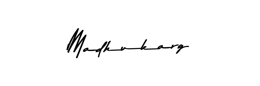Make a beautiful signature design for name Madhukarg. With this signature (Asem Kandis PERSONAL USE) style, you can create a handwritten signature for free. Madhukarg signature style 9 images and pictures png