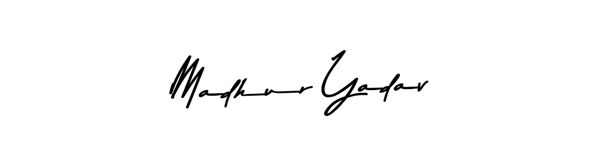 Create a beautiful signature design for name Madhur Yadav. With this signature (Asem Kandis PERSONAL USE) fonts, you can make a handwritten signature for free. Madhur Yadav signature style 9 images and pictures png