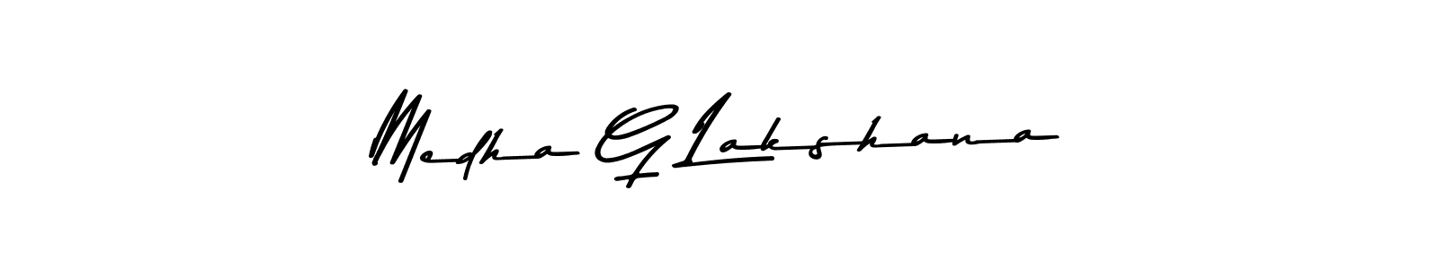 How to make Medha G Lakshana name signature. Use Asem Kandis PERSONAL USE style for creating short signs online. This is the latest handwritten sign. Medha G Lakshana signature style 9 images and pictures png