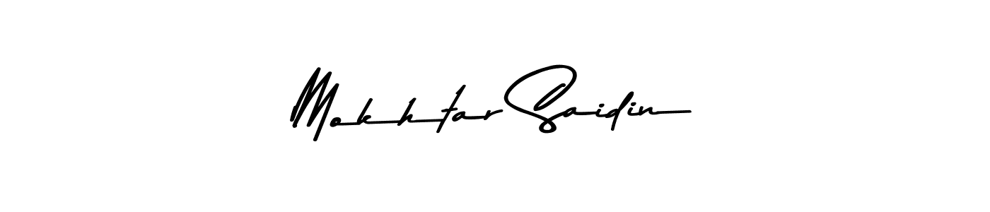 How to make Mokhtar Saidin name signature. Use Asem Kandis PERSONAL USE style for creating short signs online. This is the latest handwritten sign. Mokhtar Saidin signature style 9 images and pictures png