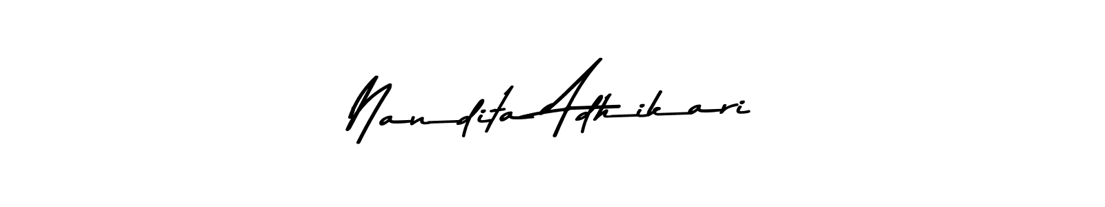 How to make Nandita Adhikari name signature. Use Asem Kandis PERSONAL USE style for creating short signs online. This is the latest handwritten sign. Nandita Adhikari signature style 9 images and pictures png