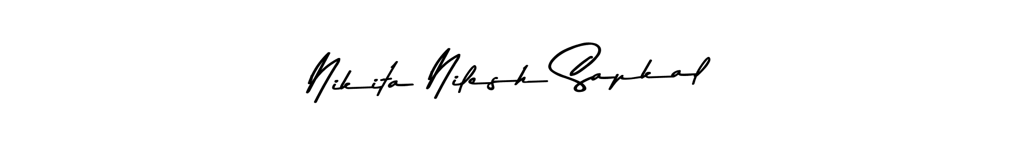 Create a beautiful signature design for name Nikita Nilesh Sapkal. With this signature (Asem Kandis PERSONAL USE) fonts, you can make a handwritten signature for free. Nikita Nilesh Sapkal signature style 9 images and pictures png
