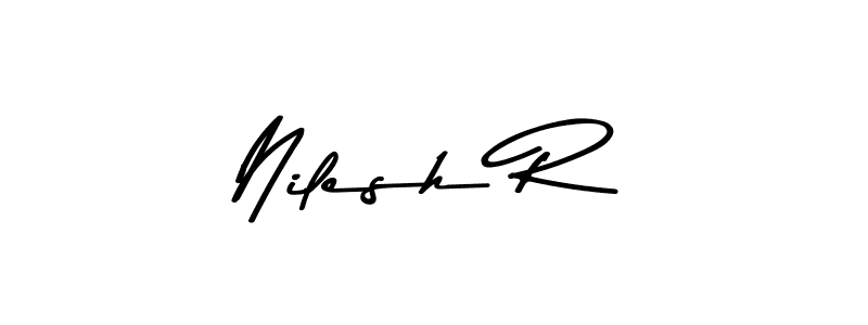 The best way (Asem Kandis PERSONAL USE) to make a short signature is to pick only two or three words in your name. The name Nilesh R include a total of six letters. For converting this name. Nilesh R signature style 9 images and pictures png