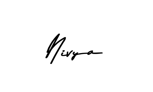 How to make Nivya name signature. Use Asem Kandis PERSONAL USE style for creating short signs online. This is the latest handwritten sign. Nivya signature style 9 images and pictures png