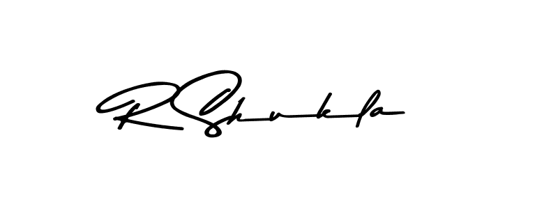How to make R Shukla name signature. Use Asem Kandis PERSONAL USE style for creating short signs online. This is the latest handwritten sign. R Shukla signature style 9 images and pictures png