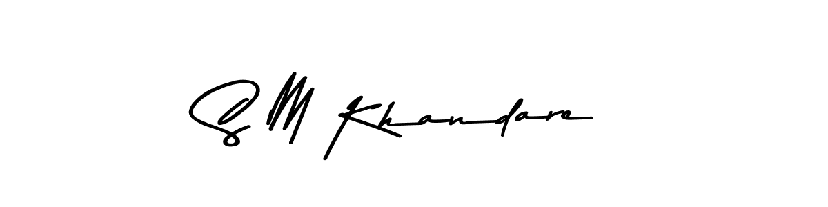 How to make S M Khandare name signature. Use Asem Kandis PERSONAL USE style for creating short signs online. This is the latest handwritten sign. S M Khandare signature style 9 images and pictures png